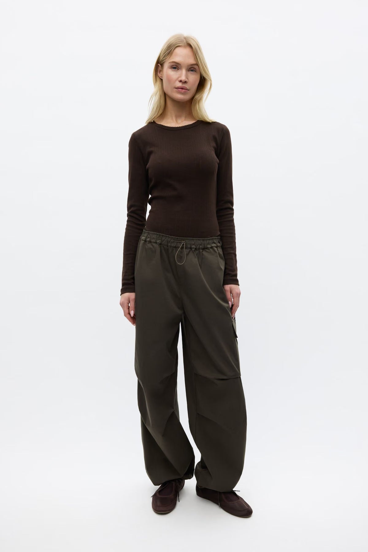 Envii Enbelou washed dark olive green wide-leg utility trousers with patch pockets.