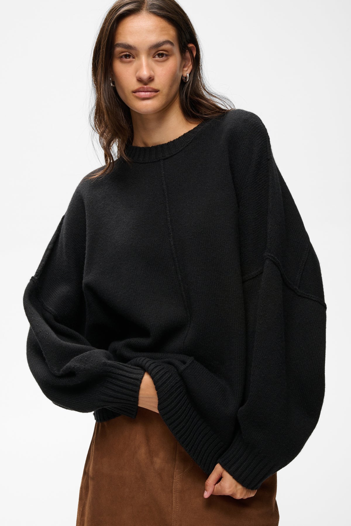 InWear NoomiiW black viscose blend knit sweater featuring long bishop sleeves with extended cuffs.