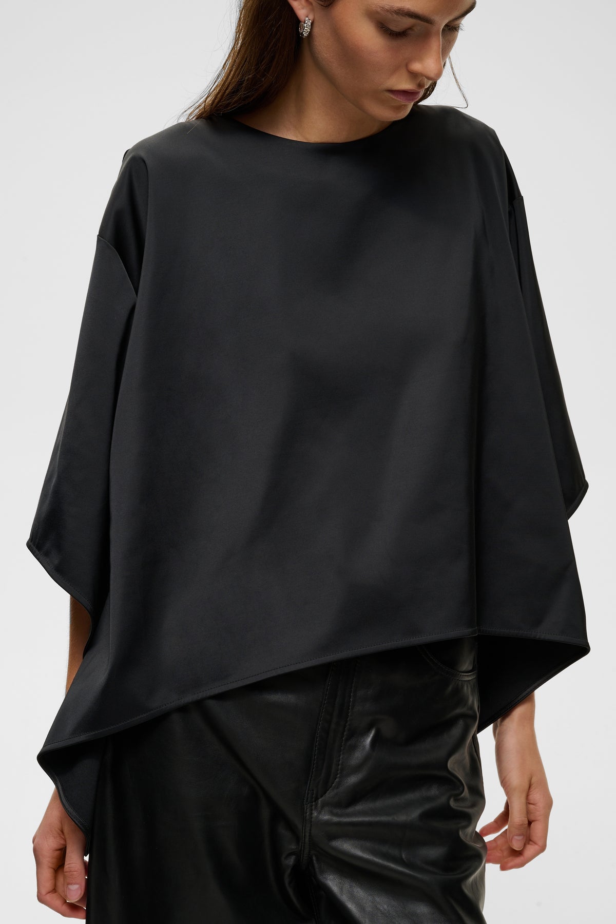 InWear Zilky black satin batwing blouse with asymmetrical draped hem.