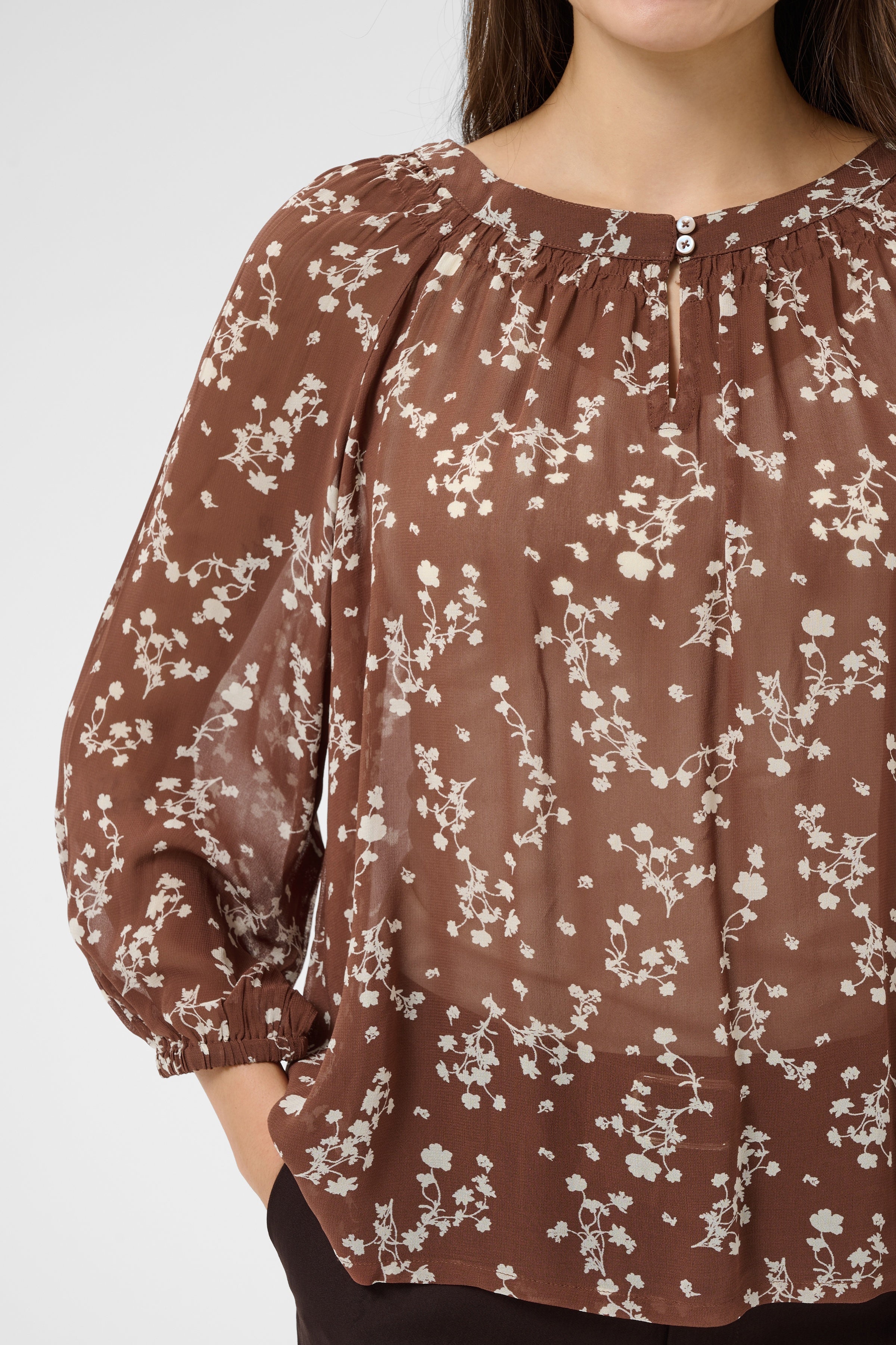 Part Two CatinPW sheer brown floral blouse featuring a gathered split neckline and 3/4 volume sleeves with elasticated cuffs.
