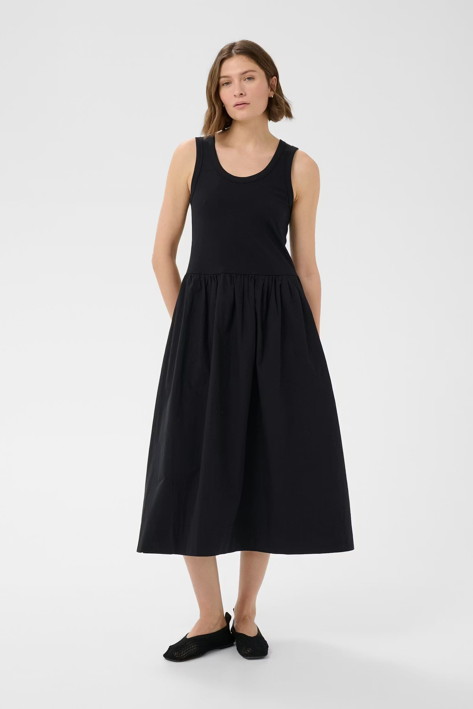 Part Two BodhiPW black tiered midi dress with voluminous sleeves and relaxed organic cotton silhouette.