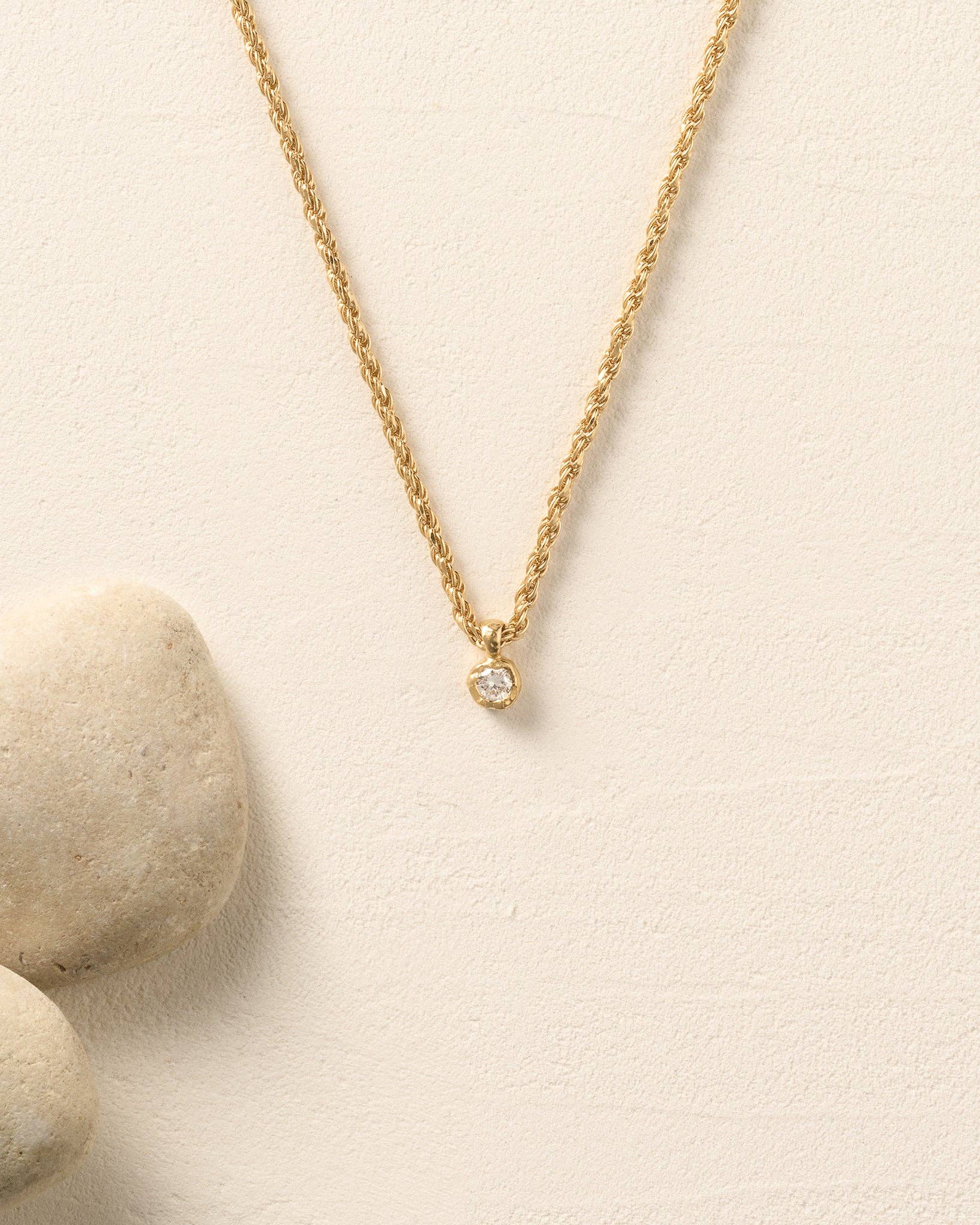 Agapée Ada delicate gold-plated twisted rope chain necklace featuring a round lab-grown diamond pendant in an organic bezel setting.