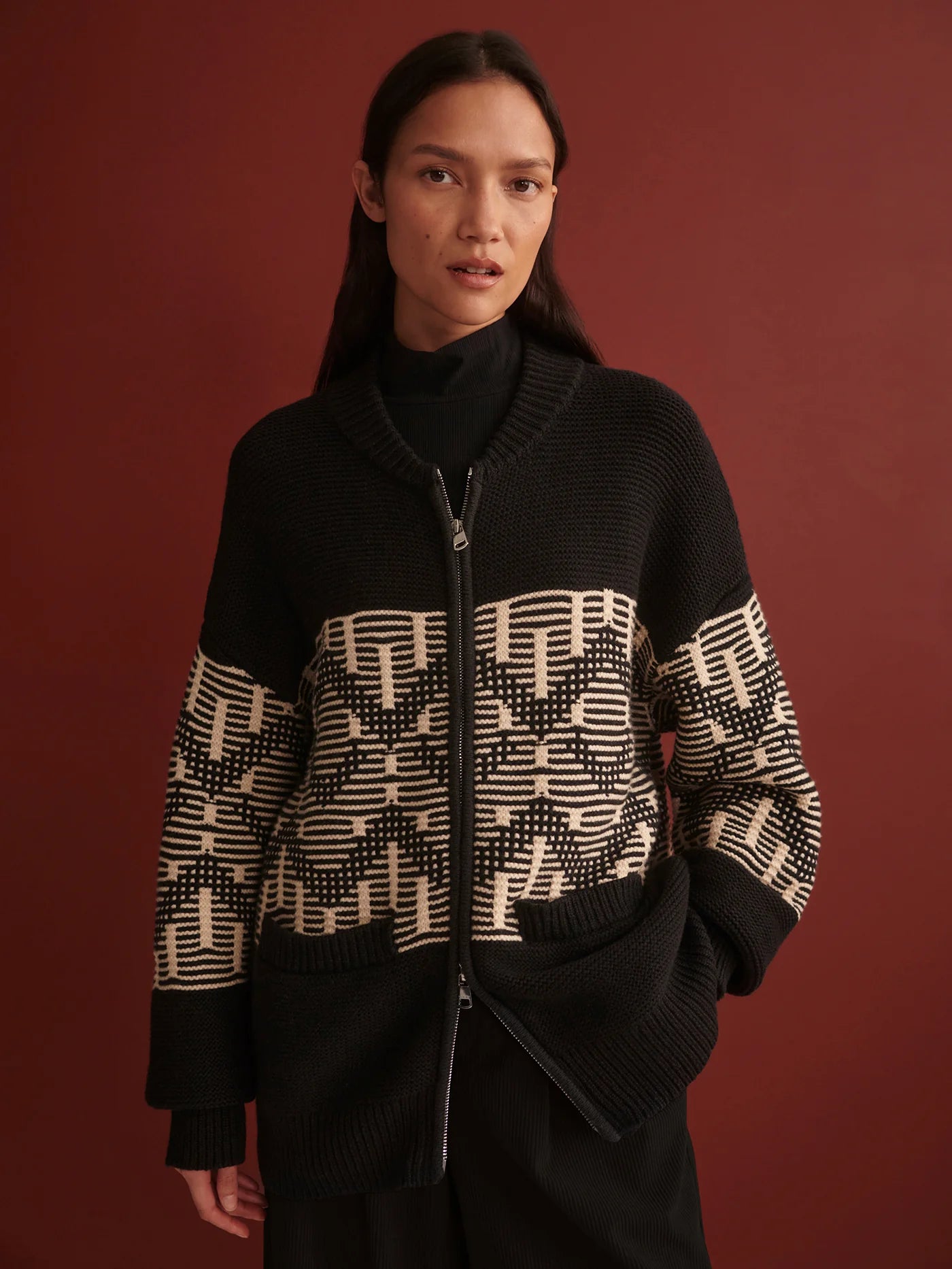 black zip through long sleeve knit jacket