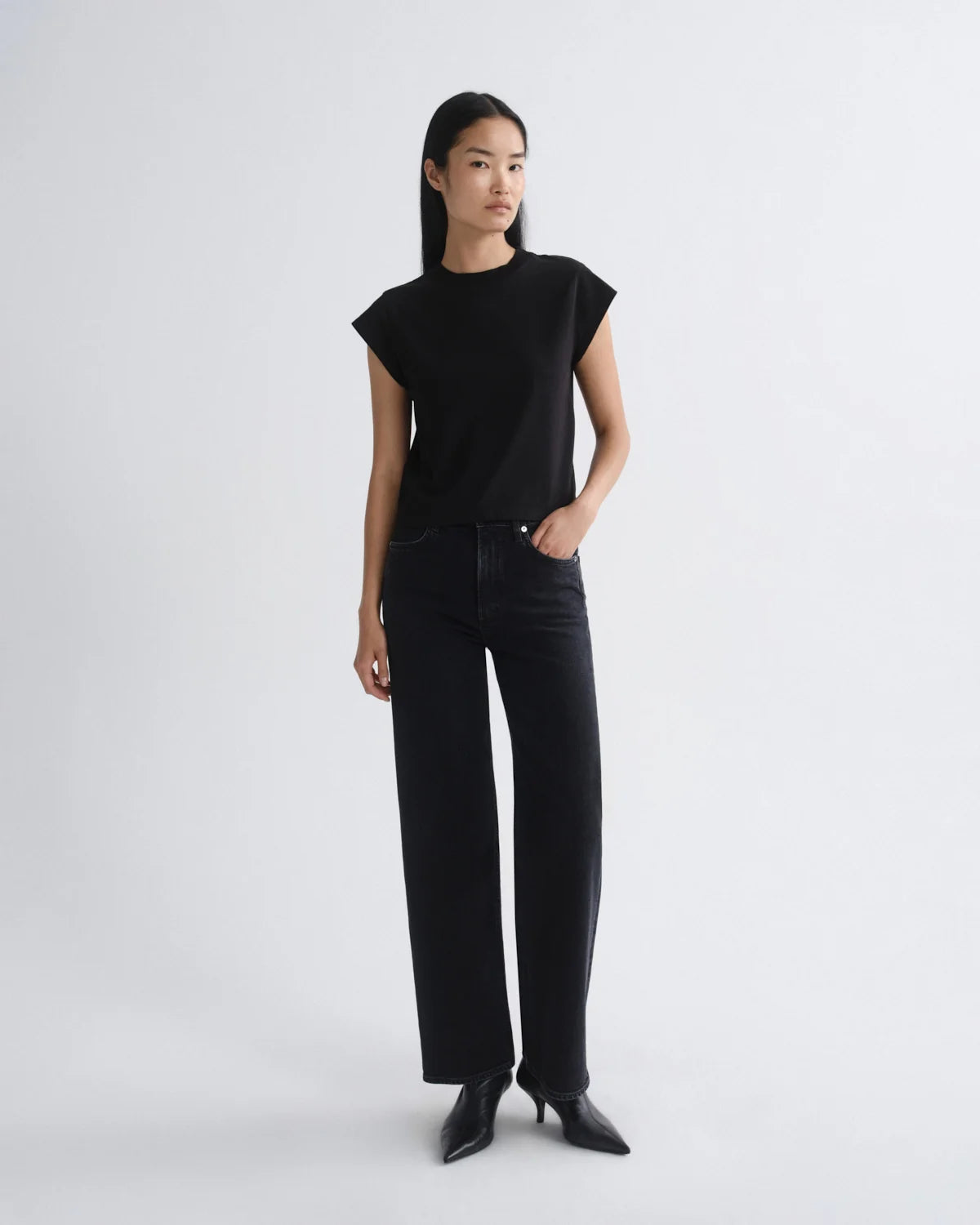 AGOLDE Ren high rise full-length wide leg stretch denim jeans in Generation medium wash.