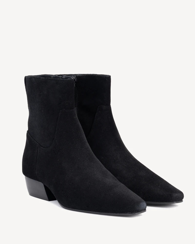 Poppy Barley The Beau tall black leather riding boot with low stacked heel.