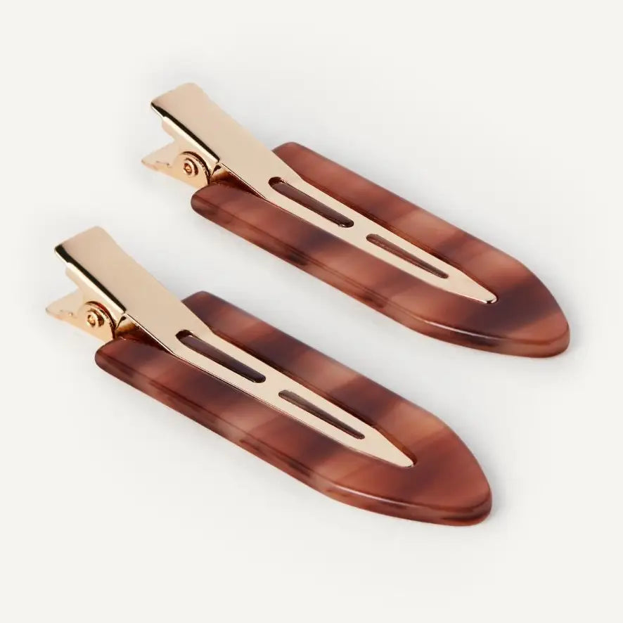 Close up of 3 inch creaseless hair clip showing smooth acetate and steel spring