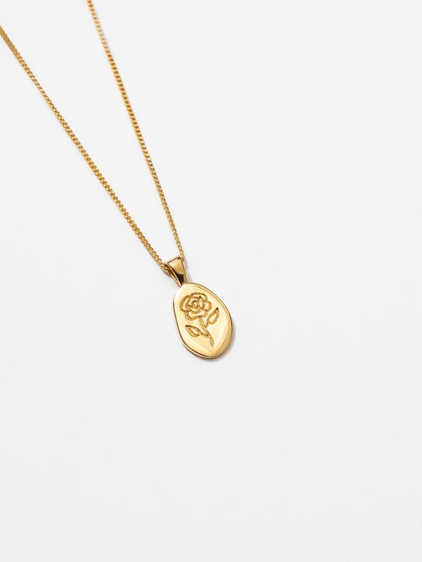 gold necklace with a rose