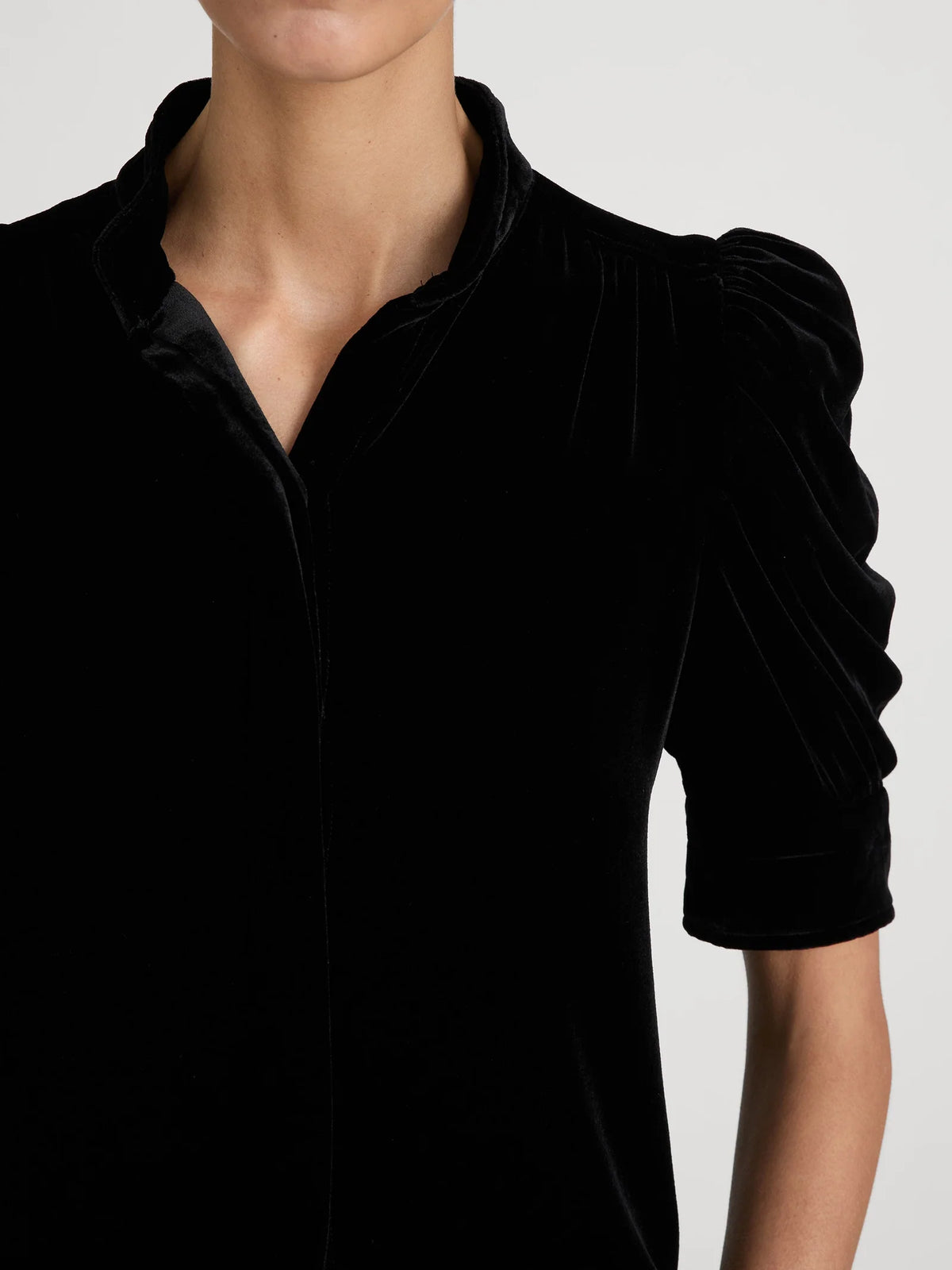 FRAME The Velvet Gillian black silk blend puff sleeve velvet blouse.