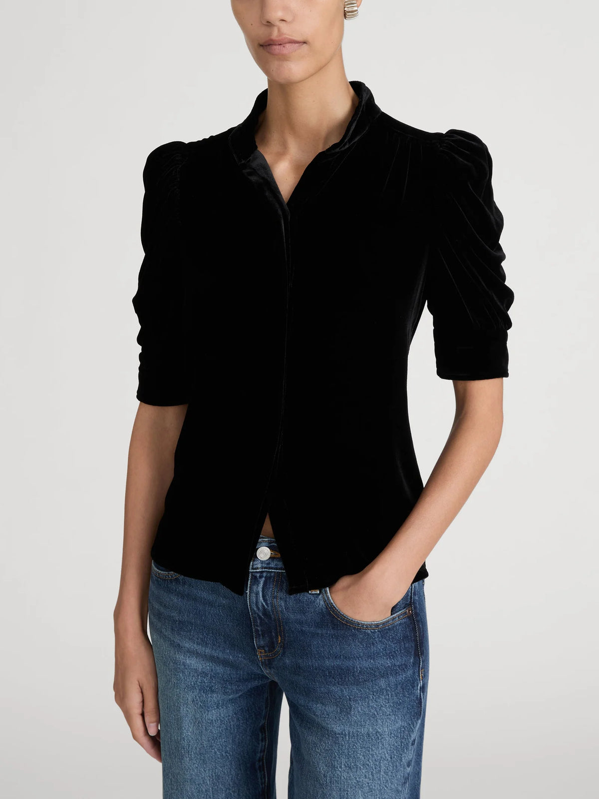 FRAME The Velvet Gillian black silk blend puff sleeve velvet blouse.