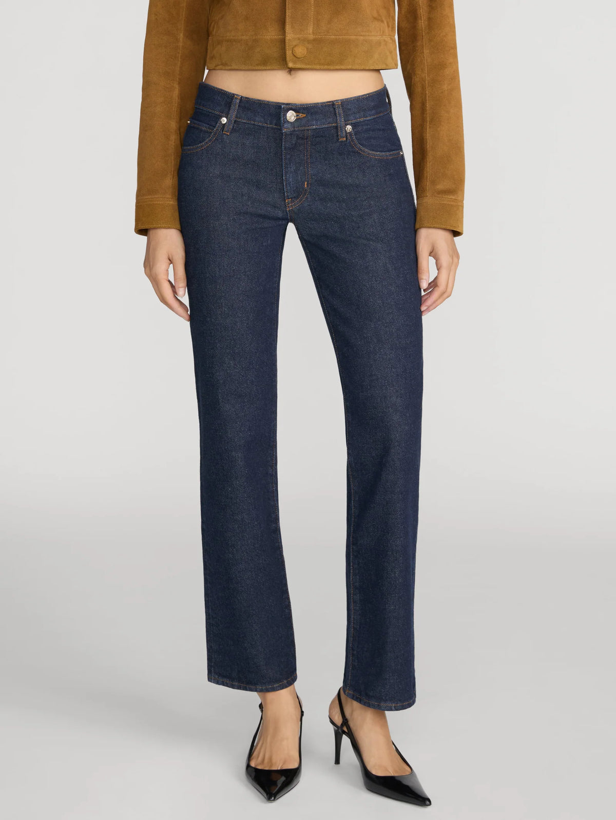 FRAME The Cigarette mid-rise dark rinse slim straight-leg jeans.