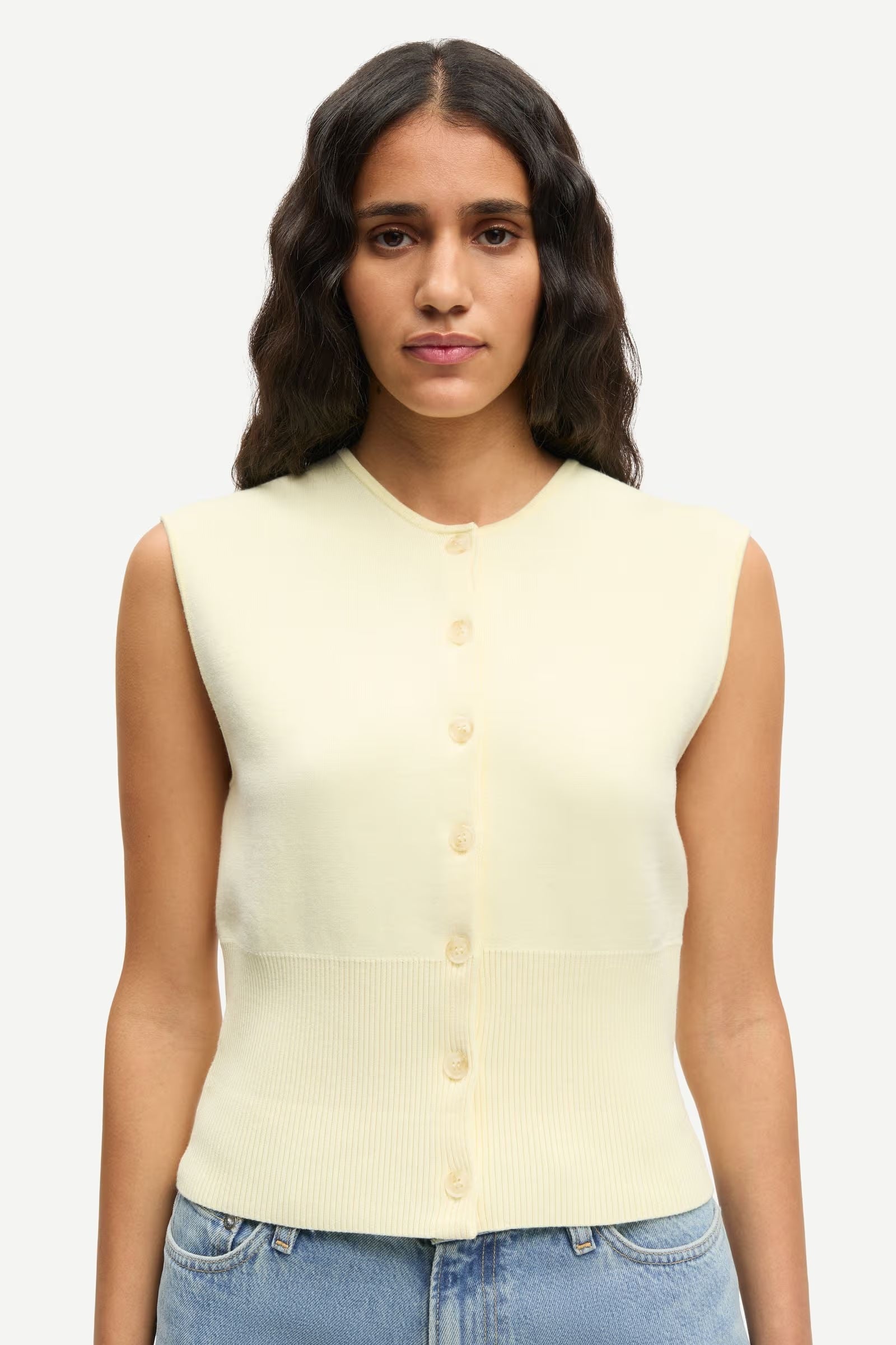 Samsøe Samsøe Saanne sweater vest in ethereal green with button closure and crew neck.