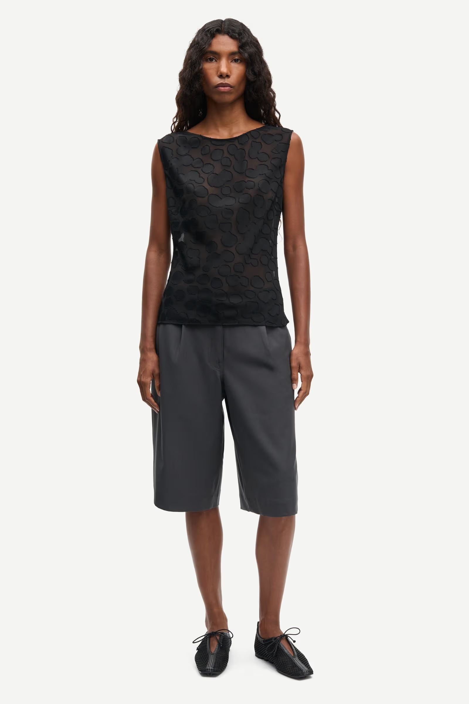 Samsøe Samsøe Saagne sleeveless semi-sheer woven top in black 100% recycled polyester.