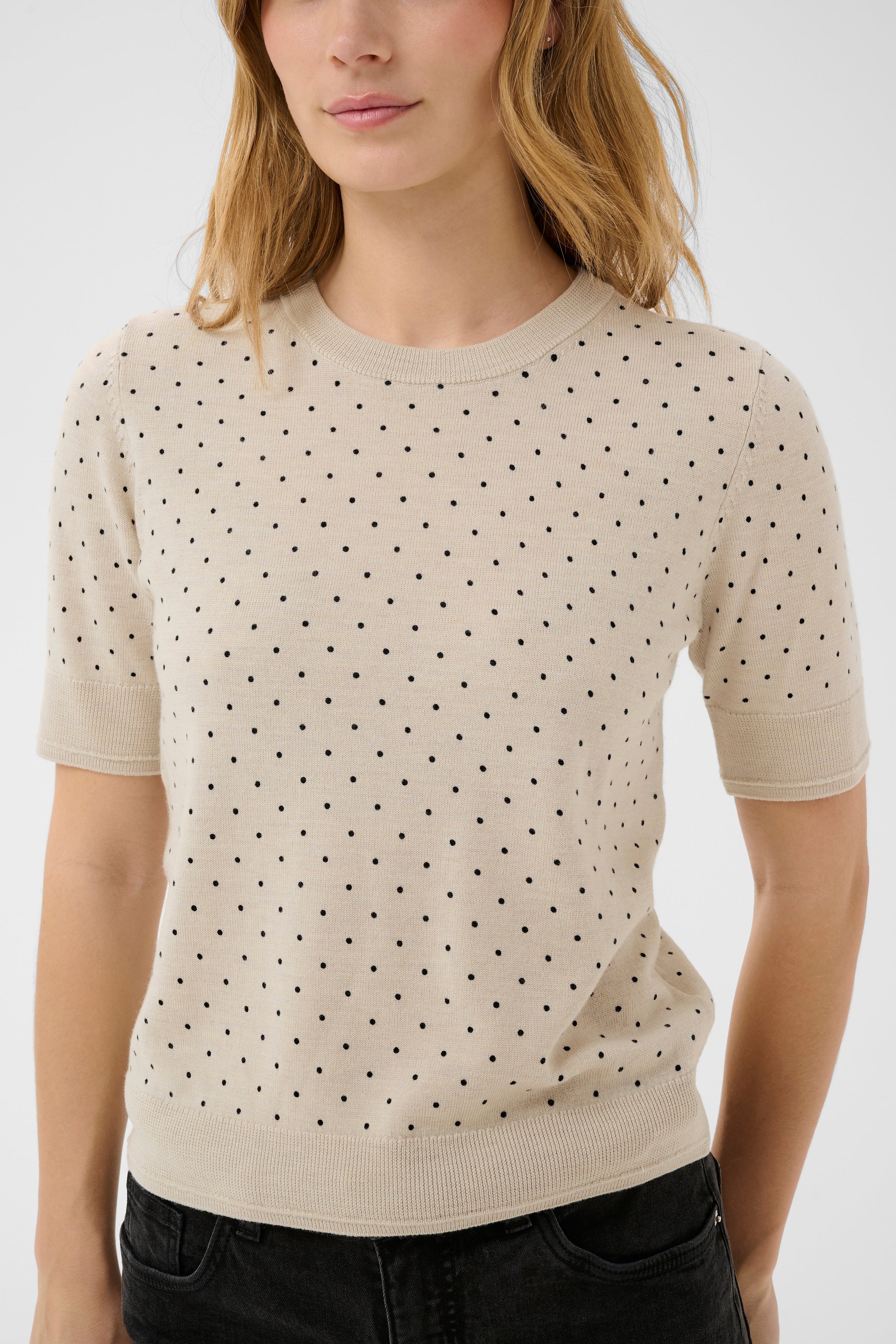 Part Two NatanyaPW short-sleeve 100% fine wool knit pullover featuring a round crew neckline and fine ribbed trims.