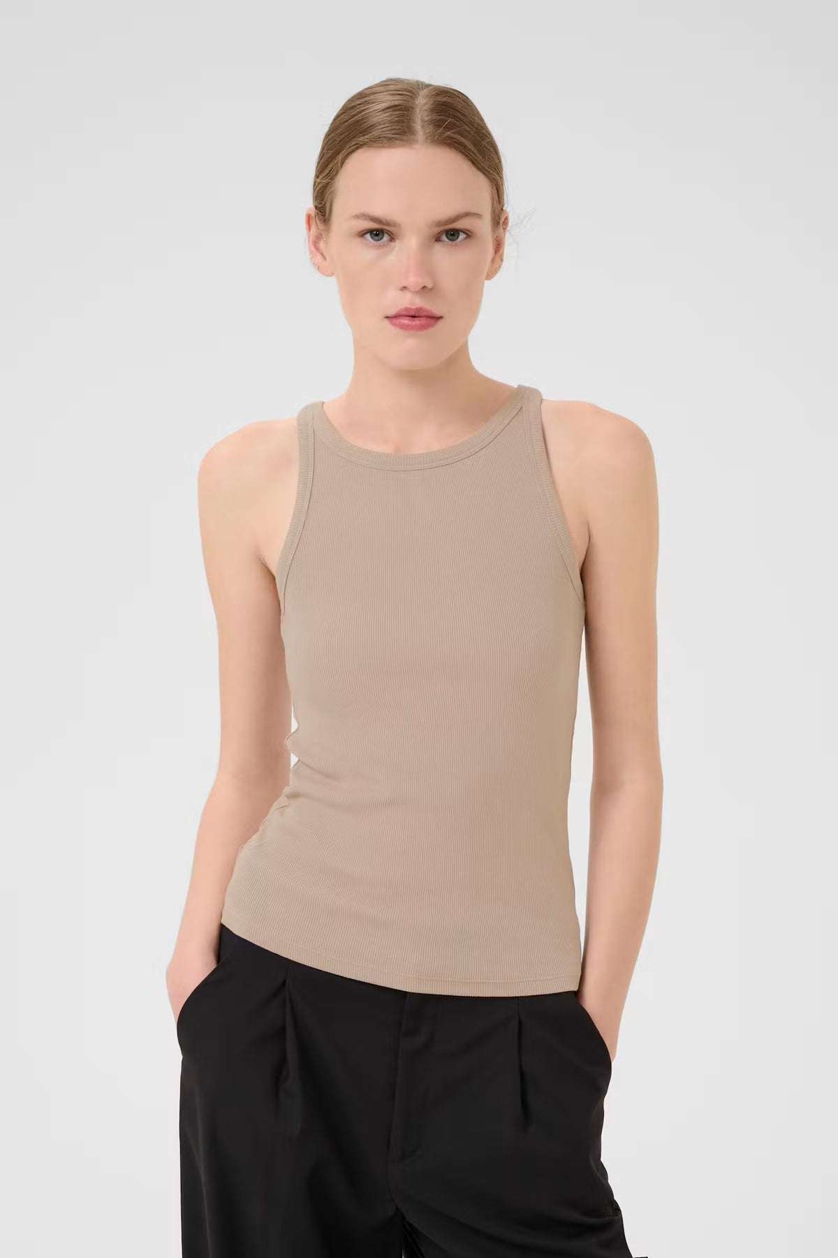 Gestuz DrewGZ white ribbed organic cotton tank top with a high neckline and fitted silhouette.