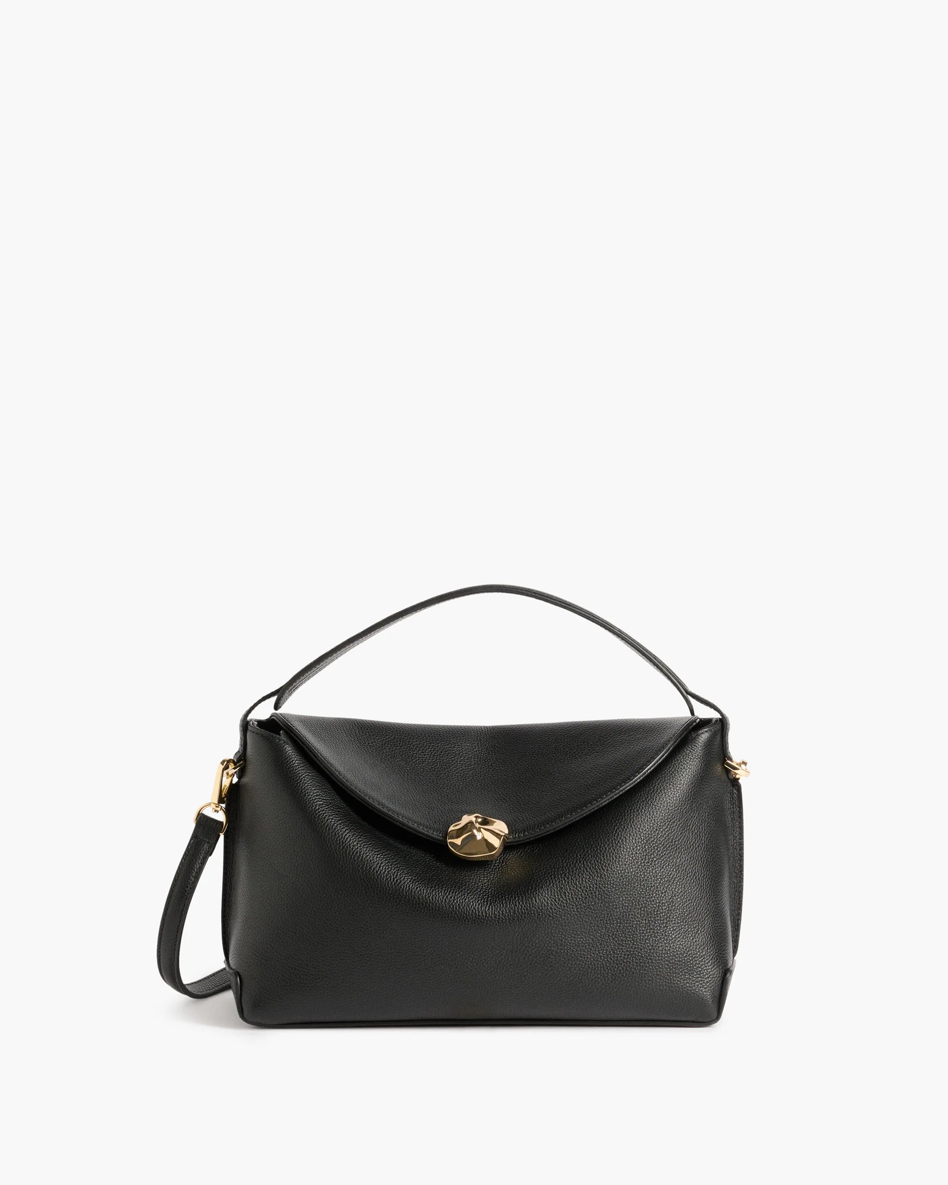 Flattered Hanna Grande structured top-handle handbag in black grained leather featuring gold hardware and a detachable crossbody strap.