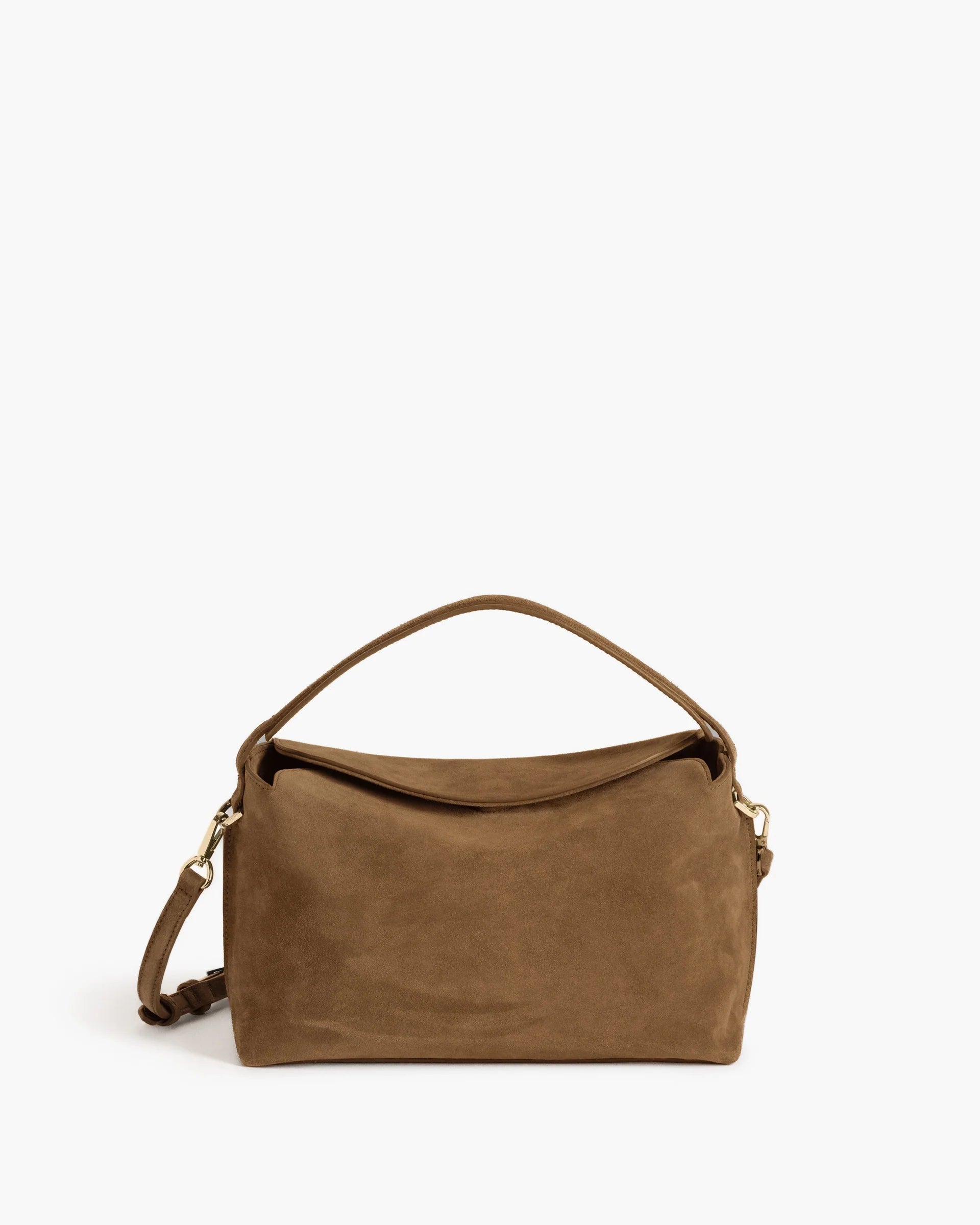 Flattered Hera minimalist top-handle handbag in premium wet sand beige suede with gold hardware and a detachable crossbody strap.