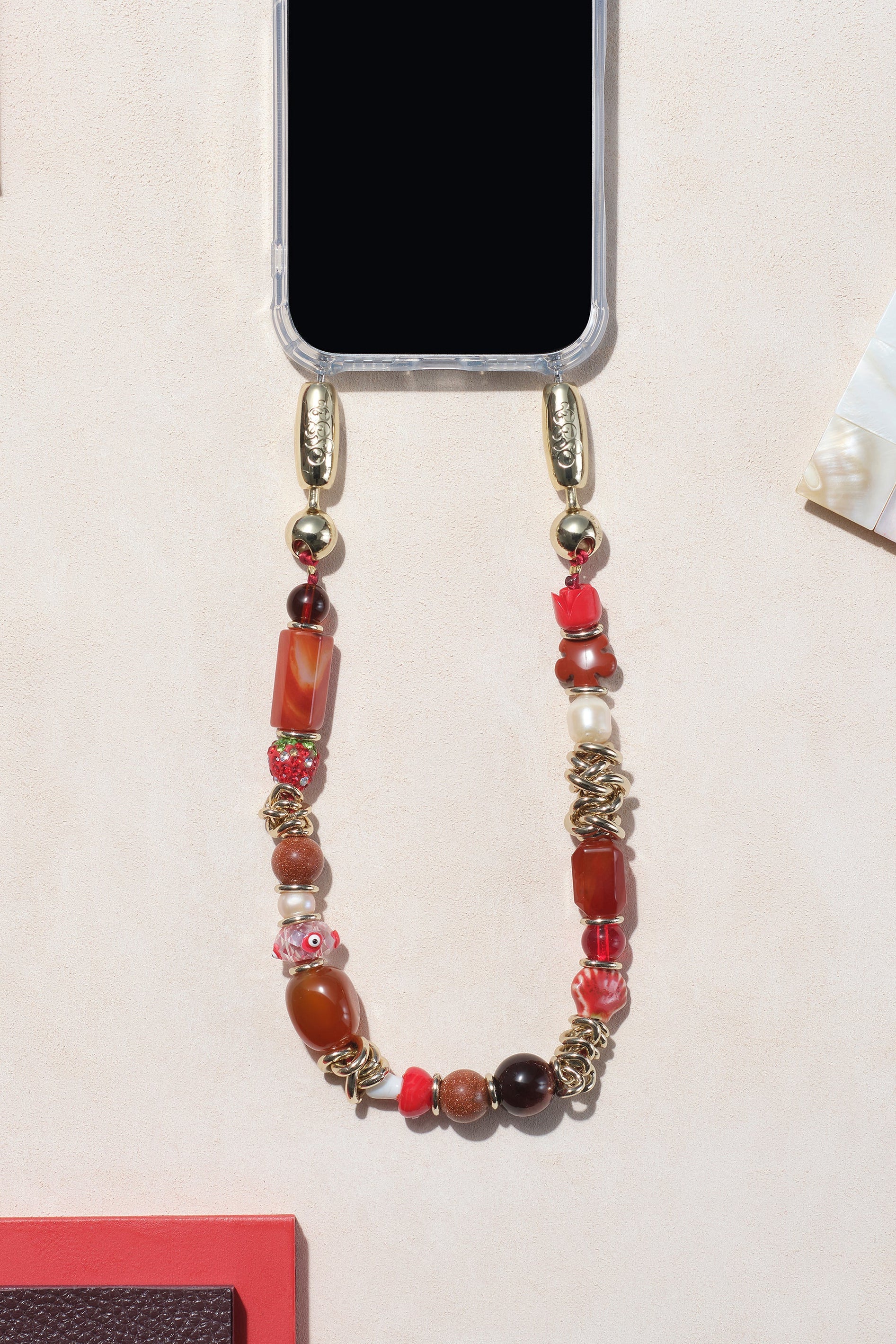 Ossa newyork phone wristet red gems 