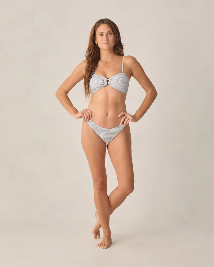 Rylee + Cru Women's Shores bandeau bikini top in Dusty Blue featuring a center O-ring and detachable straps.