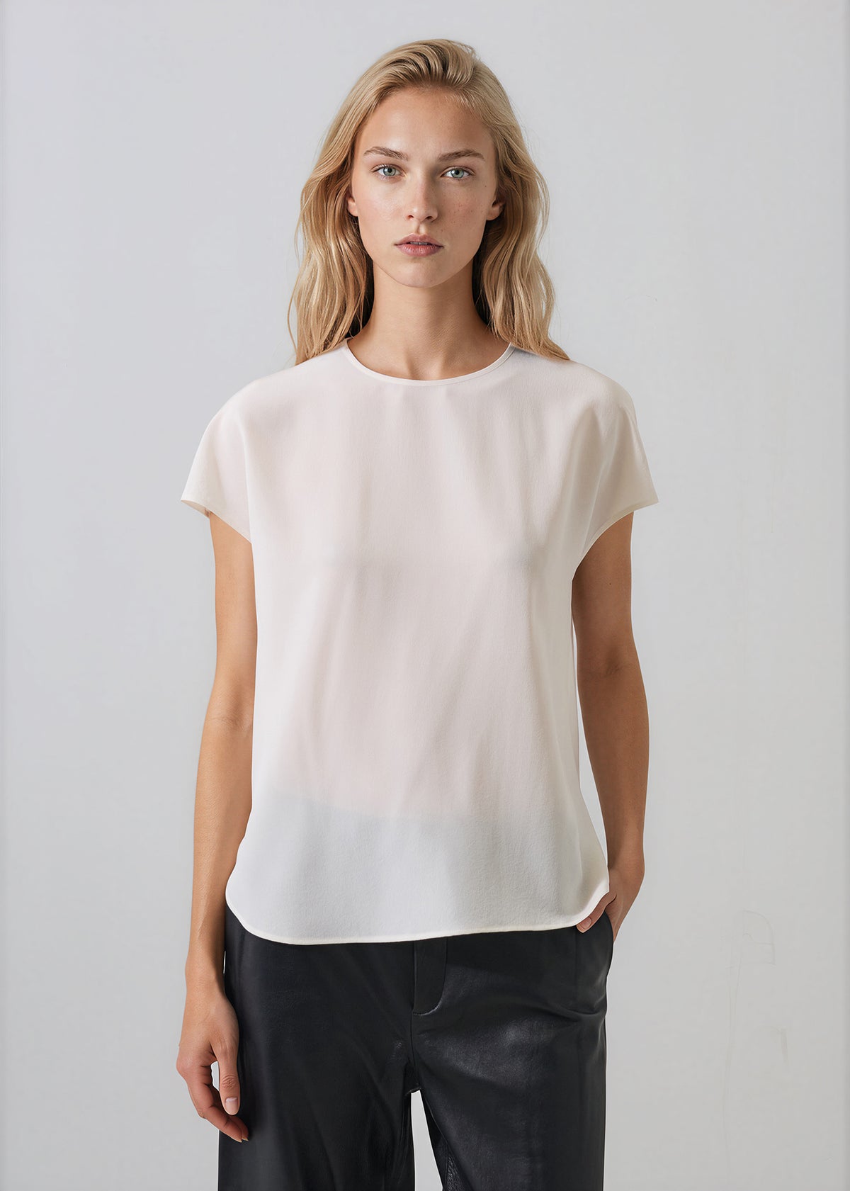Patrick Assaraf light pink short sleeve silk blouse with crew neck and cap sleeves.