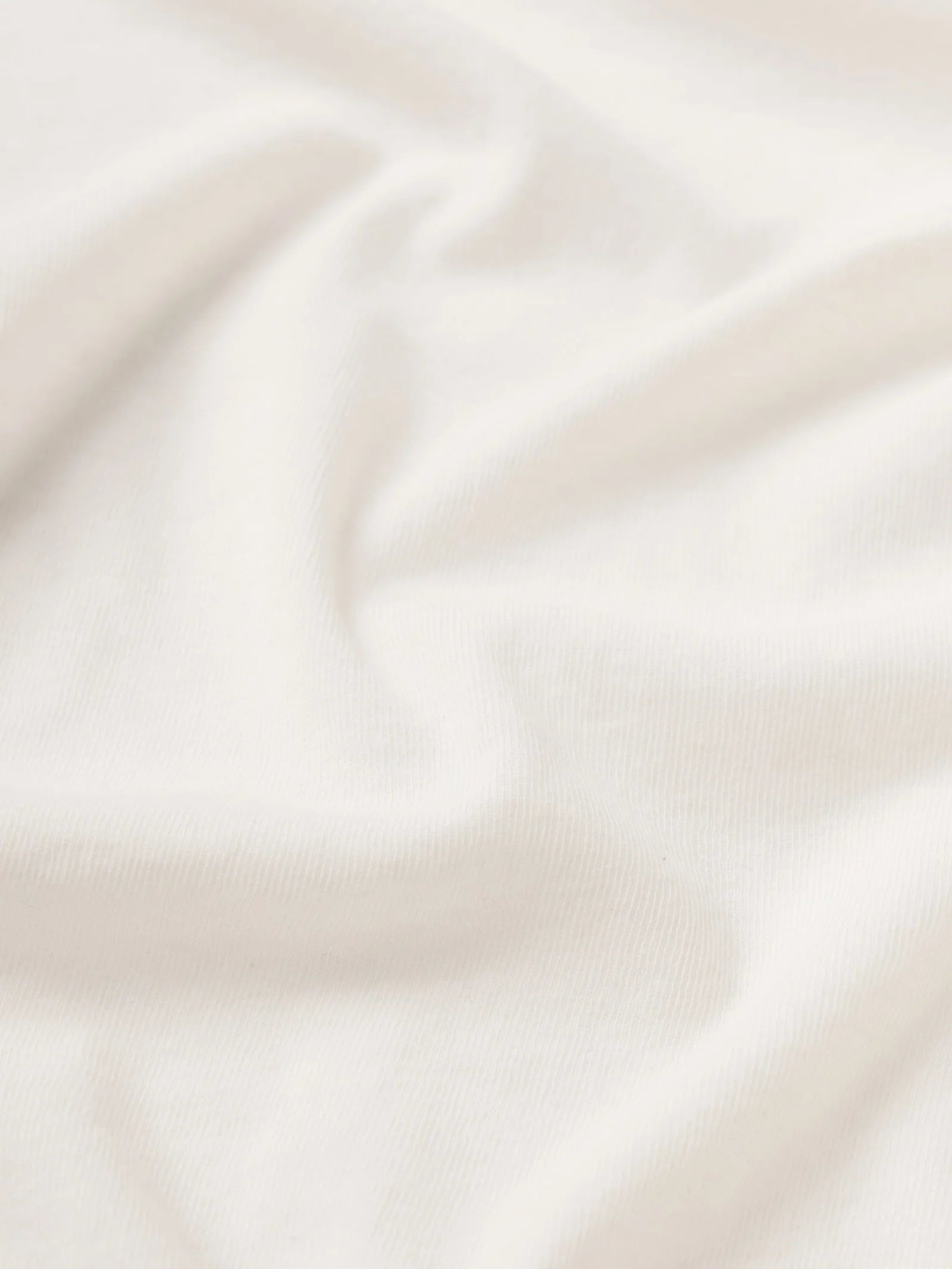 The Sheer Rib Turtleneck - Cream