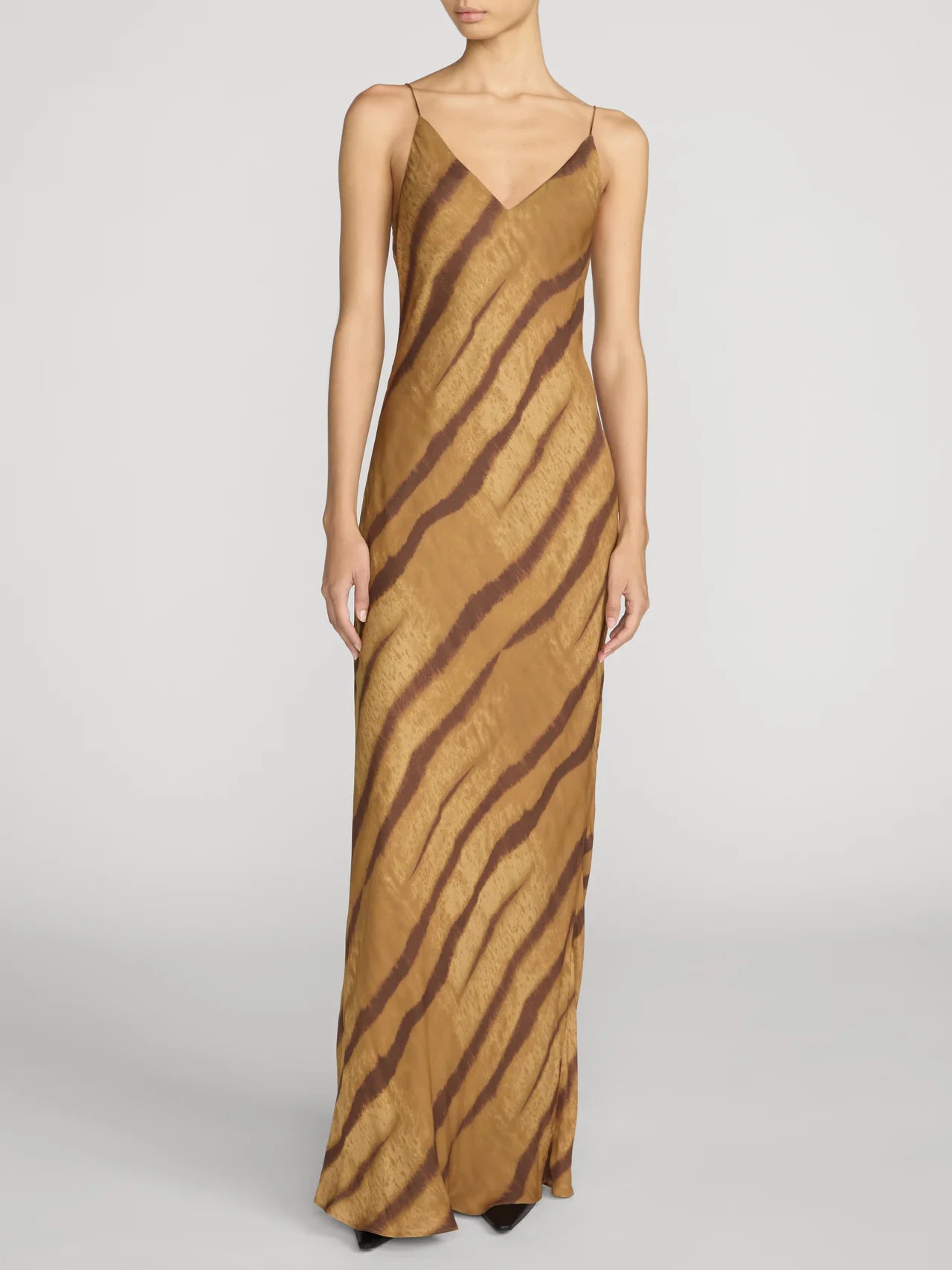 FRAME bias-cut silk maxi slip dress in Light Tiger Multi animal print featuring a deep V-neckline and delicate spaghetti straps.