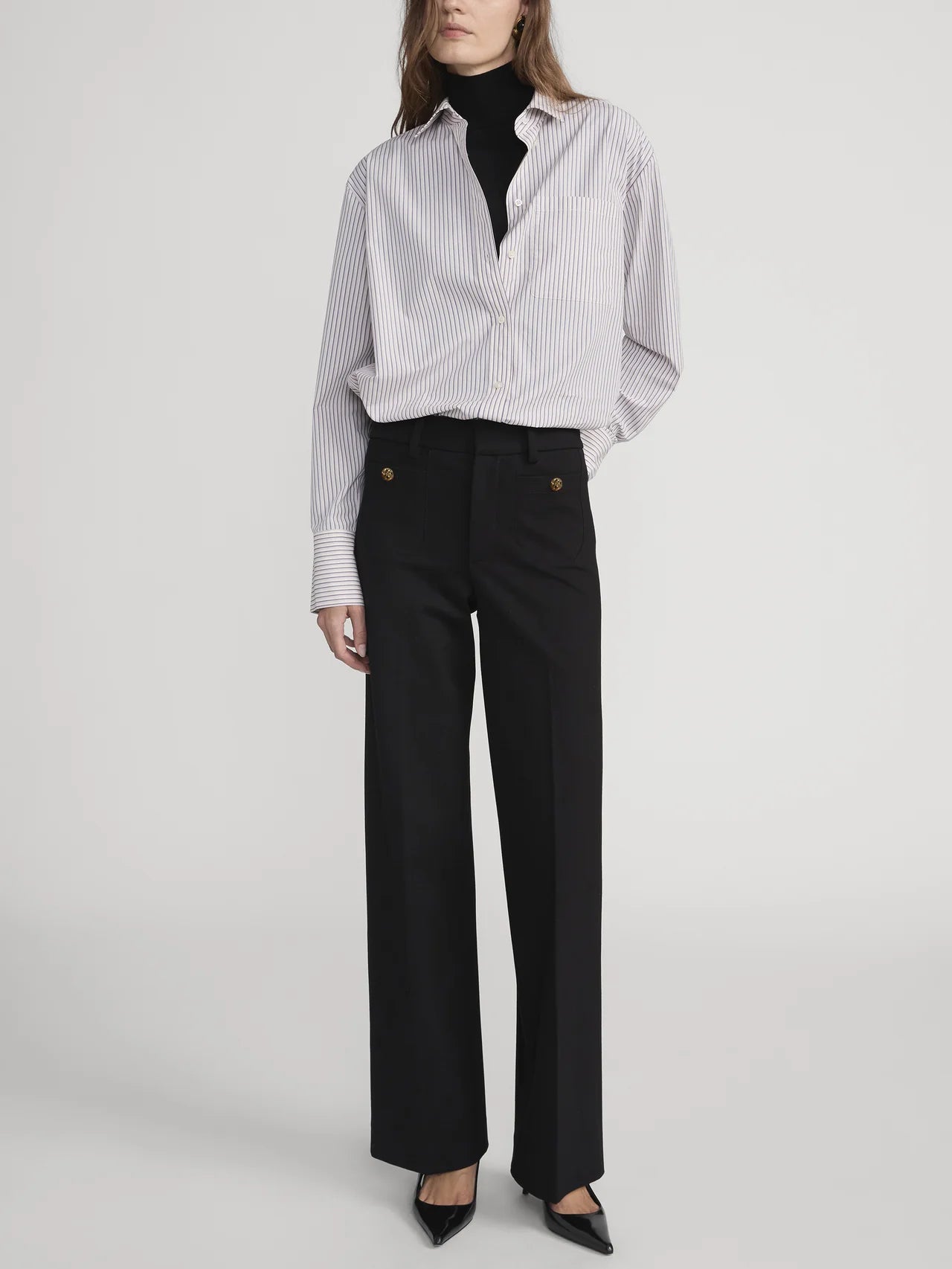 FRAME structured wide-leg black trousers in Italian stretch ponte featuring front patch pockets with gold buttons.