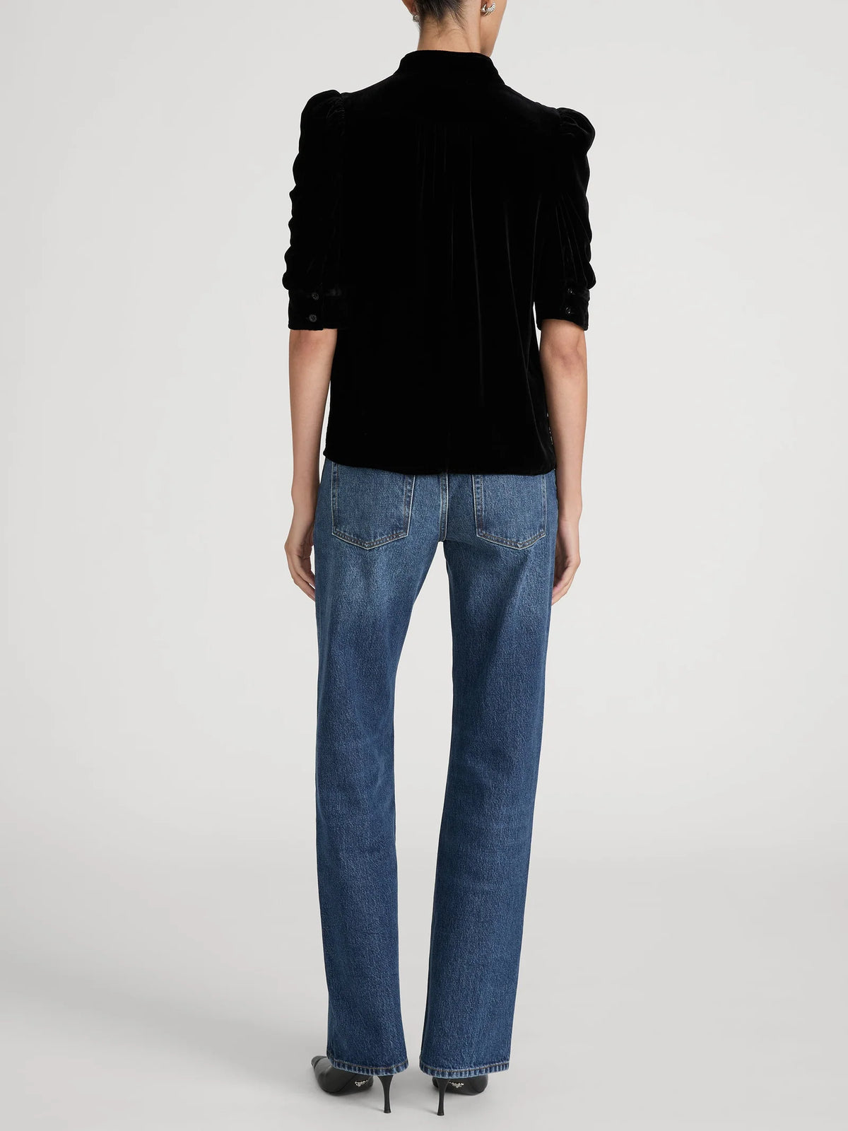 FRAME The Velvet Gillian black silk blend puff sleeve velvet blouse.