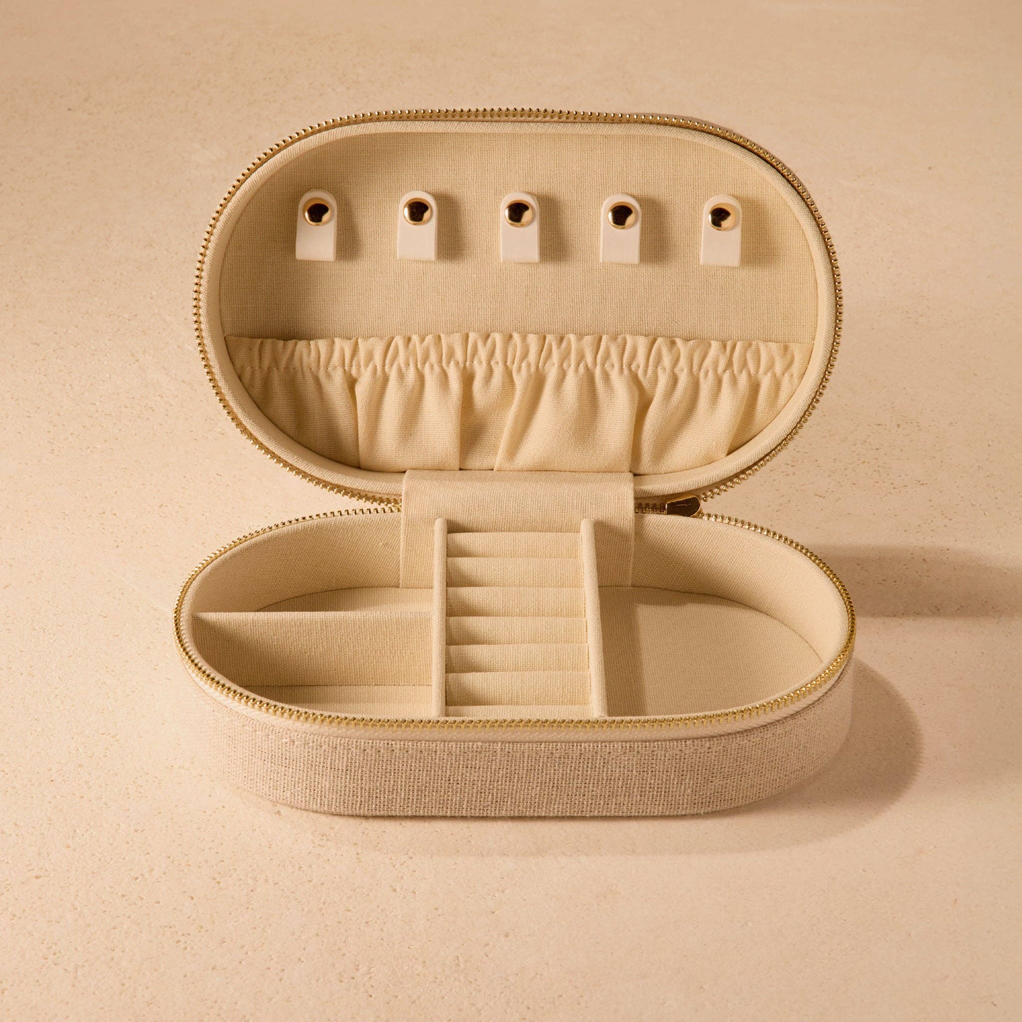 Large jewelry box in neutral cotton and linen fabric with zipper closure