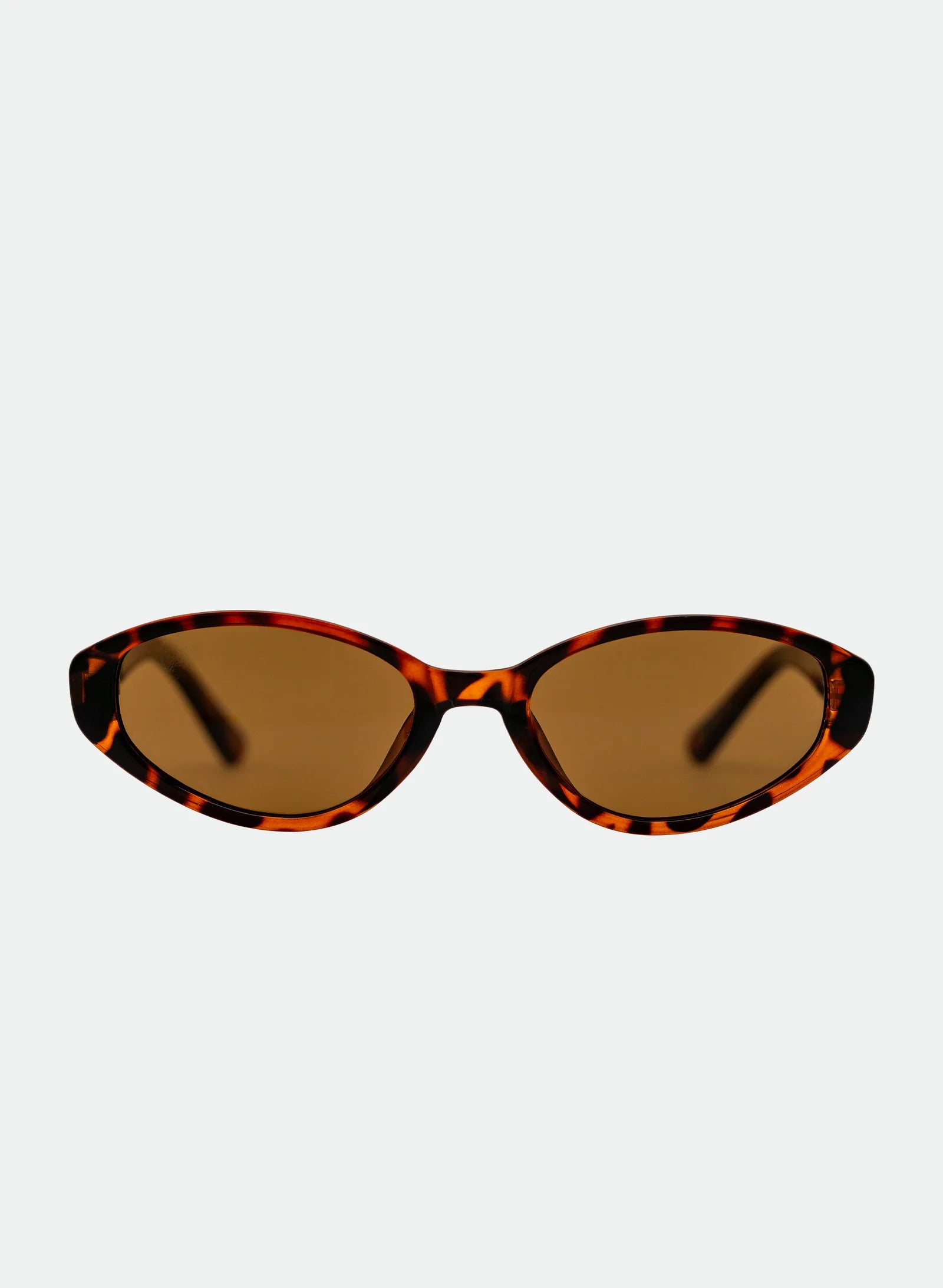 OTRA Eyewear Ivy retro-inspired cat-eye sunglasses featuring a rich tortoiseshell frame and warm brown lenses.