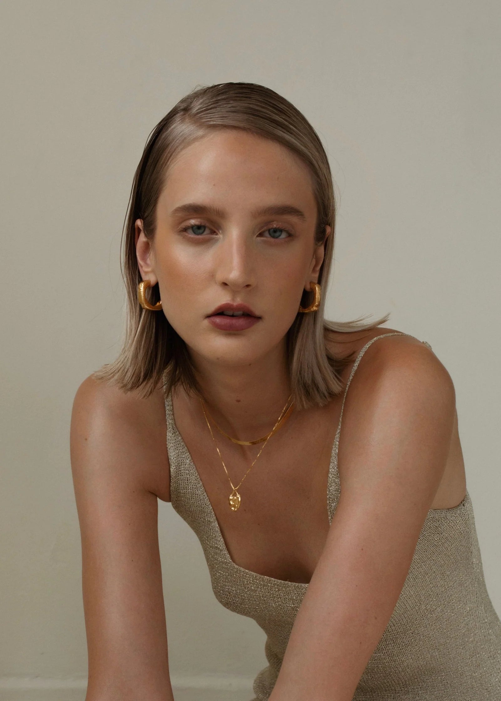 Pamela Card Unveiled Love 24K gold vermeil locket pendant necklace.