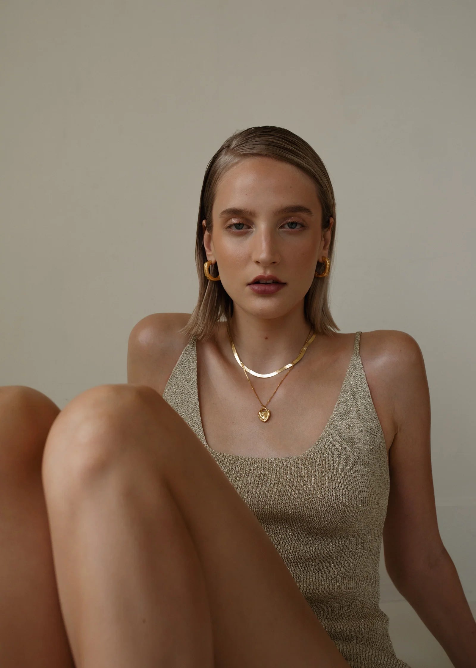 Pamela Card Unveiled Love 24K gold vermeil locket pendant necklace.